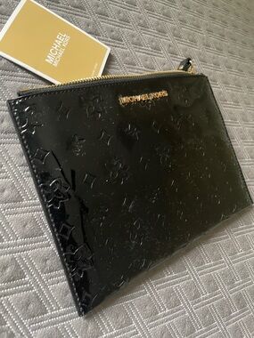 NWT!!! Michael Kors Ciara black metallic large zip clutch wristlet.